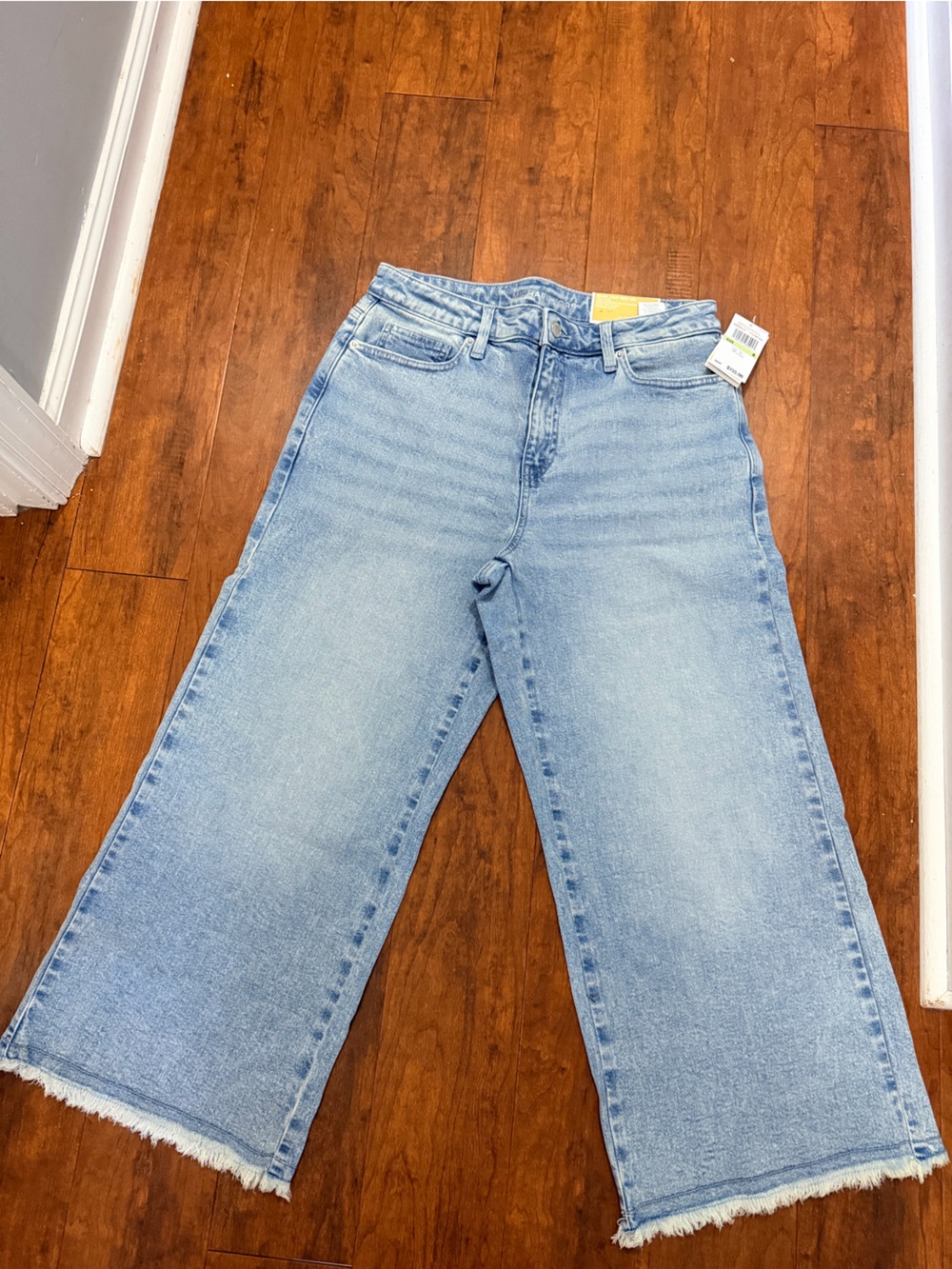 Michael Kors Selma crop Wide Leg Light wash jeans fringed ankle